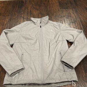 The North Face fleece lined Soft Shell jacket is an iconic size L in EUC